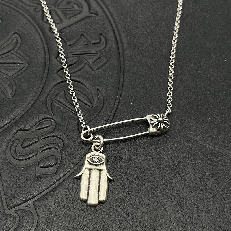 Chrome Hearts pin necklace with various elements